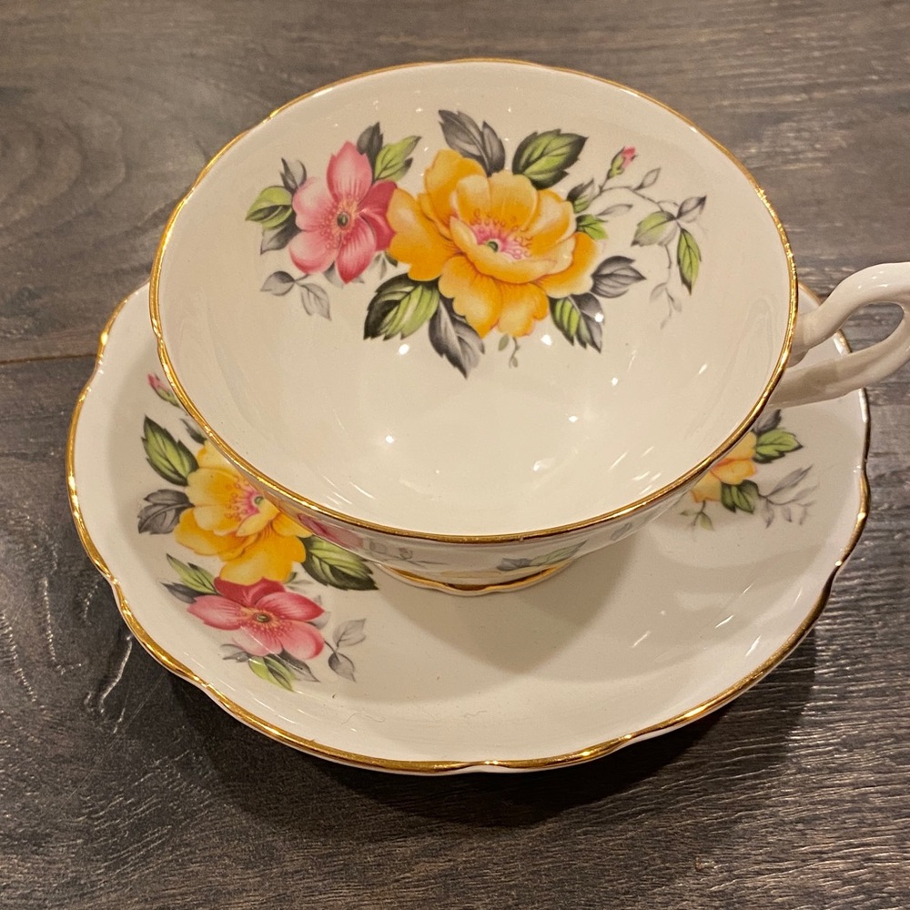 Charming Floral Mug and Saucer Set with Gold Accents